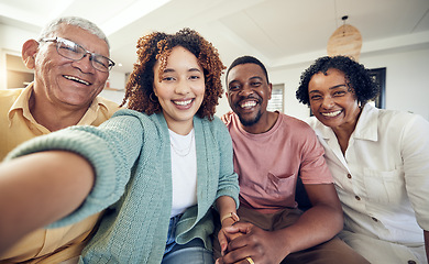 Image showing Happy, smile and selfie with black family in living room for social media, bonding and relax. Happiness, picture and generations with couple and elderly parents at home for memory, support or weekend