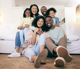 Image showing Black family, smile and portrait on couch with kids, parents and grandparents with happiness, love and care. Senior man, women and children with generations, hug and bonding in living room on floor