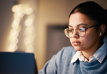 Image showing Business, student or concentration laptop in night office on financial software, investment data or mockup growth analytics. Serious, reading and working late woman on technology for finance learning