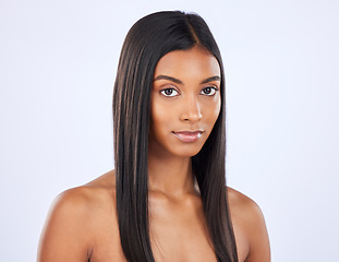 Image showing Woman, hair and beauty and haircare with cosmetic care and keratin treatment in portrait on studio background. Serious, Indian female with straight hairstyle and skin glow, Brazilian and cosmetics