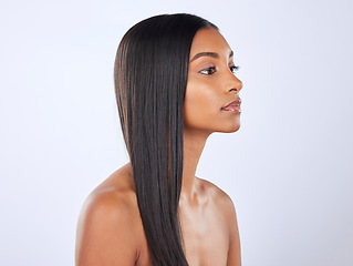 Image showing Woman, straight hair and beauty, cosmetic care and keratin treatment with haircare on studio background. Serious, Indian female with hairstyle and skin glow, Brazilian and cosmetics with growth