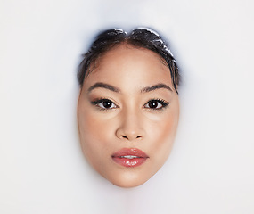 Image showing Milk bath, natural beauty and portrait of an Asian woman with makeup and cosmetics. Above, skincare and wellness of a young female model with dermatology, health aromatherapy and spa treatment