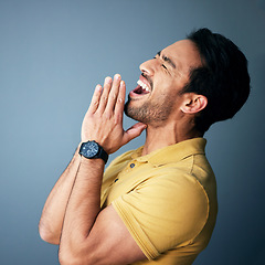 Image showing Praying, shouting and begging with a man in studio on a gray background desperate for help or assistance. Mental health, screaming and asking with an angry male suffering from grief, pain or loss