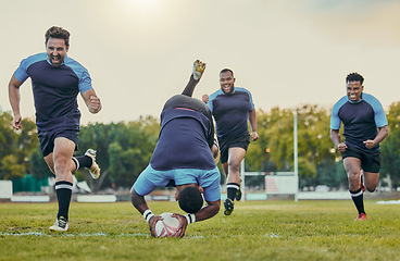 Image showing Sports, rugby and team on field, men playing game with energy and fitness, player score try and group cheers. Running, exercise and professional match, sport club with male outdoor and active