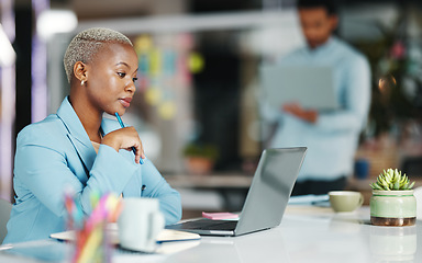 Image showing Thinking, office laptop focus and black woman, creative agent or serious person work on brand advertising plan. Project, problem solving and girl reading company report idea for social media strategy