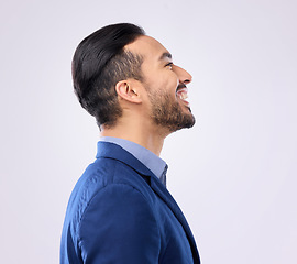 Image showing Profile, happy and vision with a business man in studio on a gray background looking to the future with motivation. Side, smile and thinking with a young male employee feeling confident or carefree