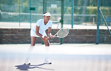 Image showing Tennis, outdoor match and black woman wait for sports ball serve with a racket on exercise court. Sport game, workout competition and young female ready for wellness and health challenge in summer