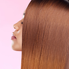 Image showing Beauty, hair and profile of black woman isolated in studio with pink background for salon advertising. Haircare, straightener and Brazilian hairstyle on model for luxury growth product promotion.