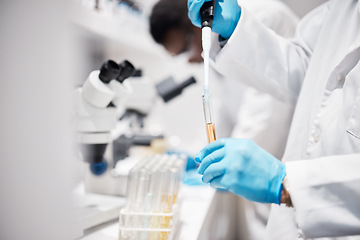 Image showing Hands, science and tube for research in laboratory with liquid, medicine or pharma product with gloves. Innovation, medical scientist and chemistry lab for study and future pharmaceutical trial