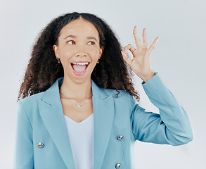 Image showing Woman, okay sign and wow face in studio for agreement, support and success. Excited female person thinking and hand gesture emoji for thank you, sale or agreement isolated on a white background