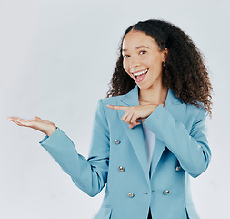 Image showing Business woman, studio and hand with space for product placement, sale or promotion deal. Happy female show hands or palm gesture for mockup, branding or advertising isolated on a white background