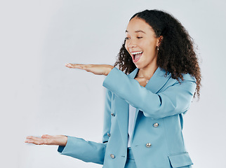 Image showing Business woman, studio and hand or space for surprise product placement, sale or promotion. Happy female show wow hands gesture for mockup size, branding or advertising isolated on a white background