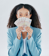 Image showing Portrait, eyes and cash with a business woman in studio on a gray background making a perfect hand gesture. Wow, finance and money with a surprised female employee holding euro bills for investment