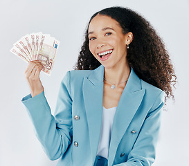 Image showing Portrait, happy and cash with a business woman in studio on a gray background making a perfect hand gesture. Smile, finance and money with a female employee holding euro bills for investment