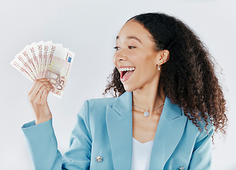 Image showing Winner, finance and cash with a business woman in studio on a gray background looking surprised or happy. Economy, wealth and money with a female employee holding euro bills for investment