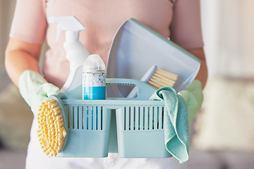 Image showing Woman, hands and cleaning equipment in housekeeping for disinfection or dirt removal at home. Hand of female cleaner holding basket of clean supplies or detergent for disinfect, hygiene or services