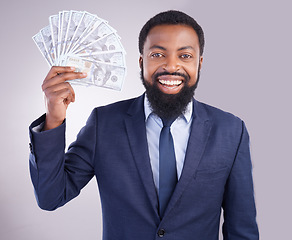 Image showing Rich, happy and portrait of a black man with money isolated on a white background in studio. Smile, wealth and an African businessman holding cash from an investment, savings or lottery on a backdrop