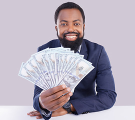 Image showing Portrait, cash and economy with a business black man in studio on a gray background as a lottery winner. Money, accounting and finance with a male employee holding dollar bills for investment