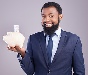 Image showing Black man, piggy bank and portrait smile for financial investment or savings against a white studio background. Happy African American businessman holding cash or money pot for investing in finance