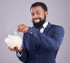 Image showing Black man, piggy bank and portrait smile in finance, budget or savings against a white studio background. Happy African American businessman holding cash and money pot for financial investment plan
