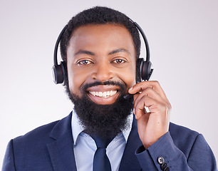 Image showing Call center, customer service and portrait of black man, studio and consulting questions on microphone. Happy male model, telemarketing consultant and contact of telecom sales, smile and crm advisor