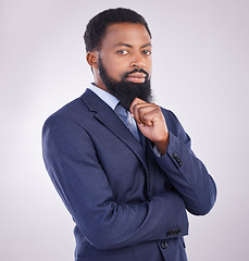 Image showing Portrait, confidence and African businessman in studio with business mindset isolated on white background. Success, pride and confident black man in suit with office job, leader in corporate Africa.