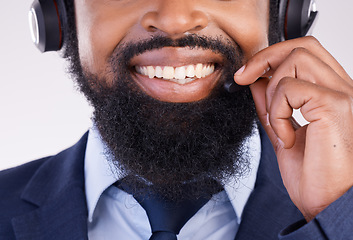 Image showing Call center, happy black man and face with microphone for crm questions, sales consulting and studio. Mouth, smile and male telemarketing consultant for contact, telecom and friendly customer support