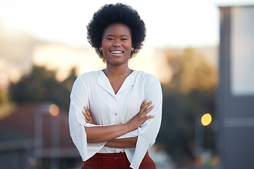 Image showing Business black woman, arms crossed and portrait in street, city and smile for confidence, mindset or mission. African entrepreneur, manager or businesswoman with happiness outdoor for company success