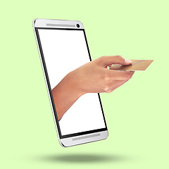 Image showing Hands, phone and credit card on mockup screen for ecommerce or online shopping against studio background. Hand of shopper in mobile banking app on smartphone display for electronic transaction