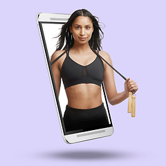 Image showing Woman, phone and screen on mockup for fitness, advertising or marketing against a studio background. Portrait of active fit female with skipping rope on mobile smartphone display for advertisement