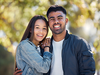 Image showing Couple, outdoor and portrait with a smile for love, care and happiness together in summer. Young man and woman at nature park for affection or hug on a happy and romantic date or vacation to relax