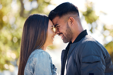 Image showing Couple, outdoor and smile on face for love, care and happiness together in summer. Head of young man and woman at nature park for affection or hug on a happy and romantic date or vacation to relax