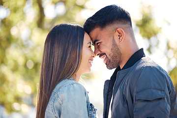 Image showing Happy couple, outdoor and smile for love, care and happiness together in summer. Head of young man and woman at nature park for affection or laughing on a romantic date, holiday or vacation to relax