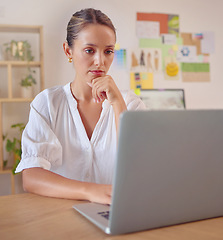 Image showing Laptop focus, thinking and business woman, fashion designer or stylist review design, illustration or digital sketch. Office reading, creativity and serious person contemplating creative trend idea