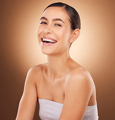 Image showing Studio beauty, face portrait and happy woman with luxury facial cosmetics, natural makeup and skincare glow. Dermatology healthcare, spa salon person and aesthetic female model on brown background