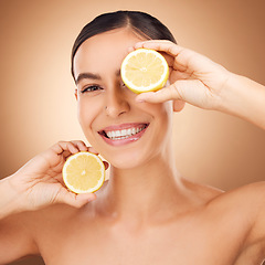 Image showing Lemon skincare, portrait and woman face cleaning of a young person with happiness in a studio. Happy, smile and dermatology treatment of a female with cosmetics, spa and cosmetology luxury facial