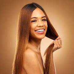 Image showing Smile, beauty and haircare portrait of woman in studio for growth, color shine or healthy texture. Aesthetic female happy for strong hair, natural makeup and hairdresser or salon on brown background