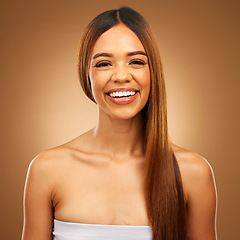 Image showing Smile, beauty and hair care portrait of woman in studio for growth, color shine or healthy texture. Happy female face for haircare, natural makeup and hairdresser or salon on brown background