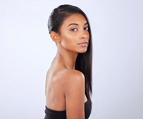 Image showing Indian woman, hair care or mockup in studio portrait for strong, healthy natural shine or wellness. Face of glowing young girl model, beauty spa or self care cosmetics in grooming on white background