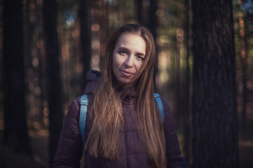 Image showing Pretty happy woman in forest