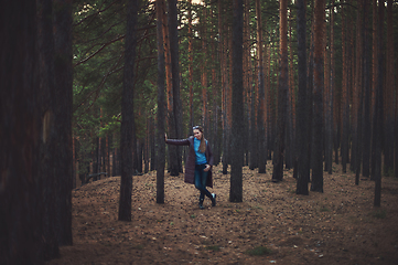 Image showing Pretty happy woman in forest