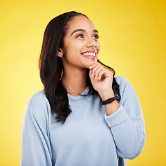 Image showing Yellow background, thinking and face of woman with smile for advertising, promotion and mockup space. Ideas, thoughtful and isolated girl in studio with happy mindset, positive attitude and confident