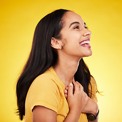 Image showing Woman laugh, profile and studio with a excited young model happy with casual fashion. Isolated, yellow background and gen z, student and female person with a smile feeling happiness and surprise