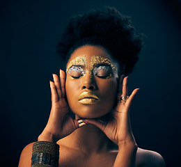 Image showing Beauty, gold and metallic with black woman and makeup in studio for luxury, cosmetics and African pride. Natural, creative and goddess with female model on background for queen, bronze or glamour art