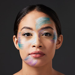 Image showing Art, aesthetic and portrait of woman with face paint, creative makeup and self expression. Beauty, creativity and color in artistic cosmetics, skincare and freedom to express for young beautiful girl