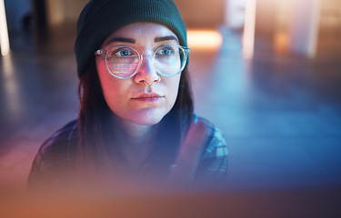 Image showing Cybersecurity, phishing and woman hacker working on a computer in the basement at night for malware. Database, password and ransomware with a female coder hacking a digital transformation network