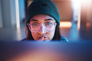 Image showing Cybersecurity, ransomware and woman hacker working on a computer in the basement at night for phishing. Database, password and malware with a female coder hacking a digital transformation network