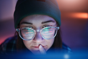 Image showing Cyber security, ransomware and woman hacker working on a computer in the basement at night for phishing. Database, password and malware with a female coder hacking a digital transformation network