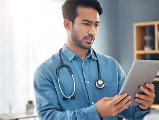 Image showing Tablet, serious man and doctor in healthcare office for telehealth, solution and research. Digital technology, unsure or confused medical worker and data analysis for online test results of clinic