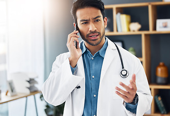 Image showing Confused doctor, man and phone call in hospital for communication, healthcare advice and life insurance. Question, medical employee and talking on smartphone for telehealth, mobile contact or problem